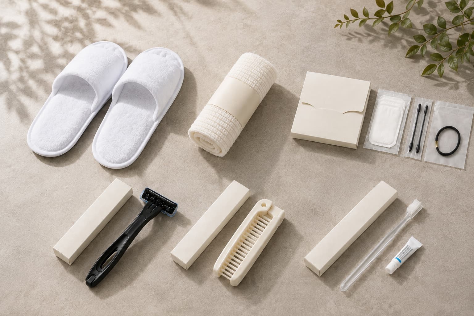 Amenity set including slippers, towels, a toothbrush and a razor