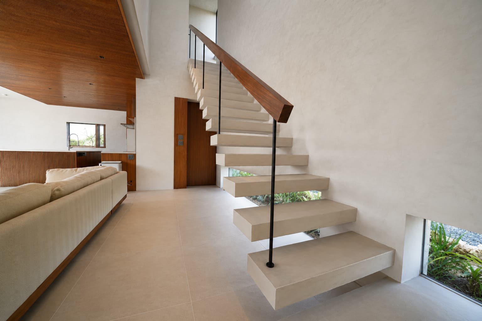 The staircase leading down to the living room
